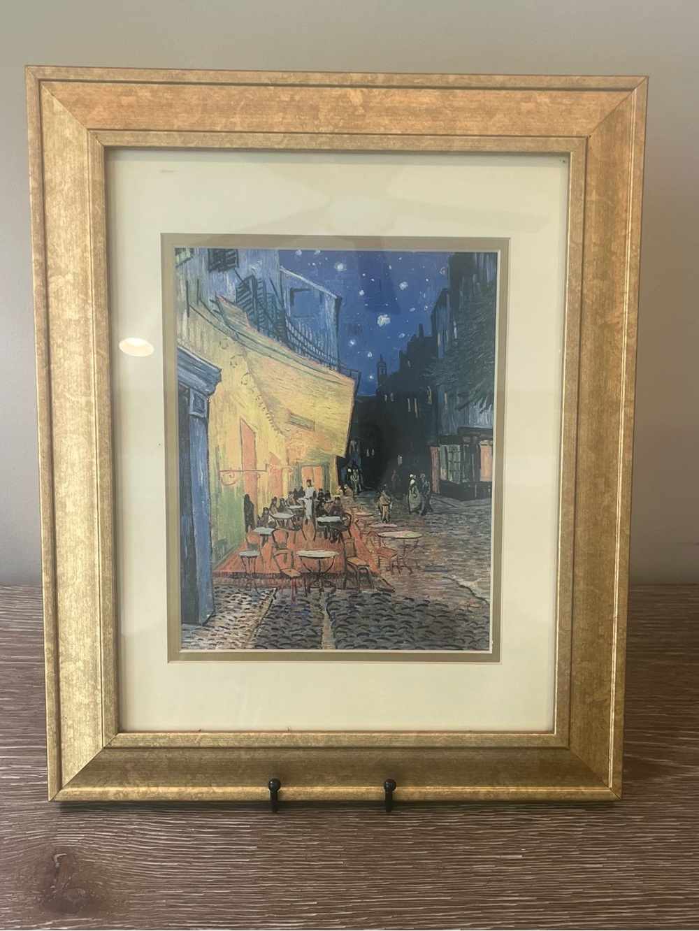 Framed Vincent van Gogh’s iconic 1888 painting, "Café Terrace at Night 14x17